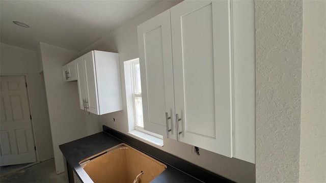 kitchen with white cabinets