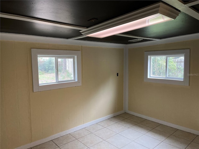 unfurnished room with light tile patterned floors