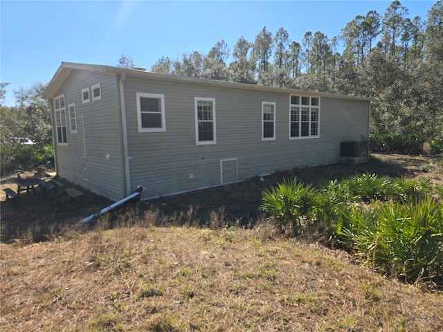 view of home's exterior featuring cooling unit