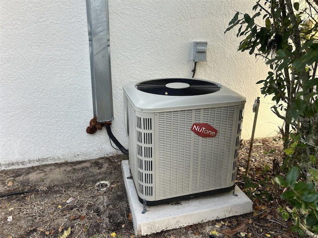 exterior details featuring cooling unit