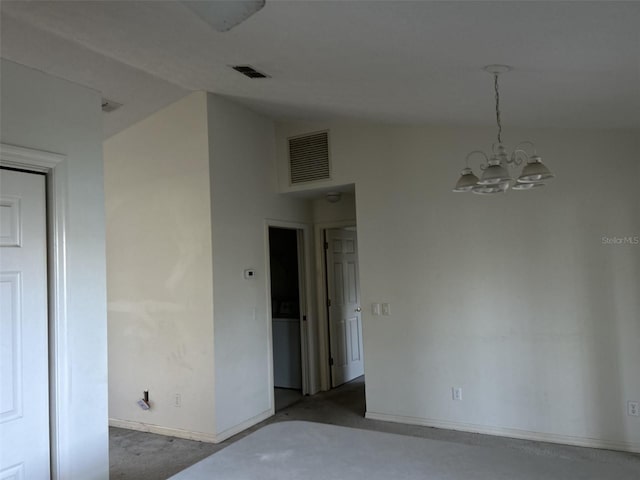 unfurnished room with lofted ceiling and an inviting chandelier