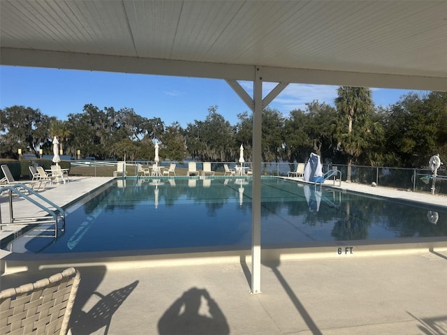 view of pool featuring a patio