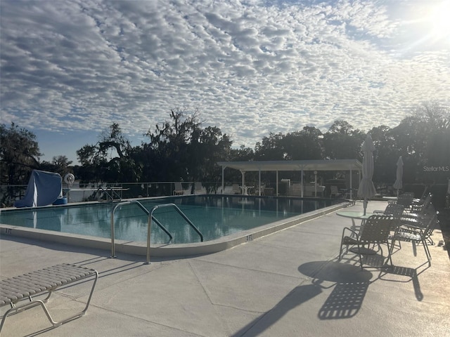 view of pool featuring a patio