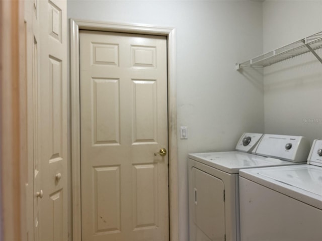 laundry area featuring washing machine and dryer