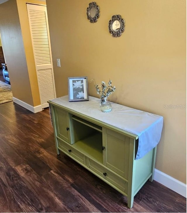 interior details featuring hardwood / wood-style flooring