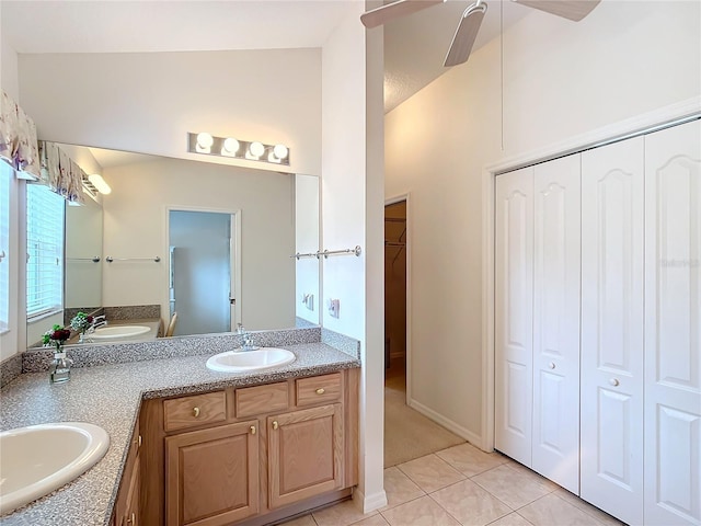 bathroom featuring ceiling fan, vanity, and tile patterned flooring