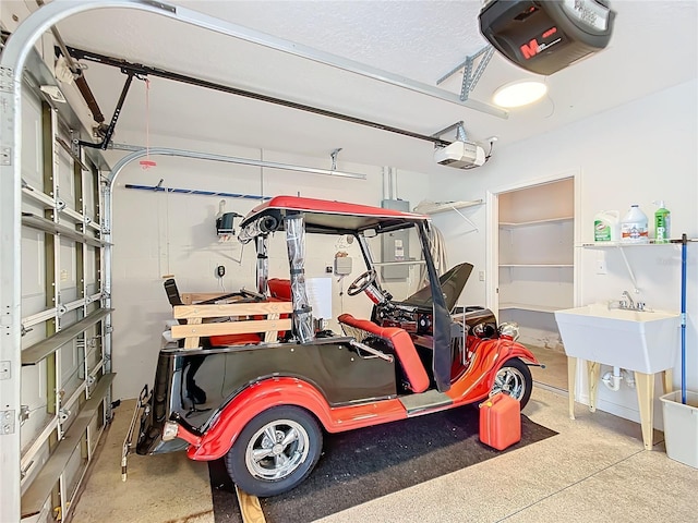 garage featuring a garage door opener