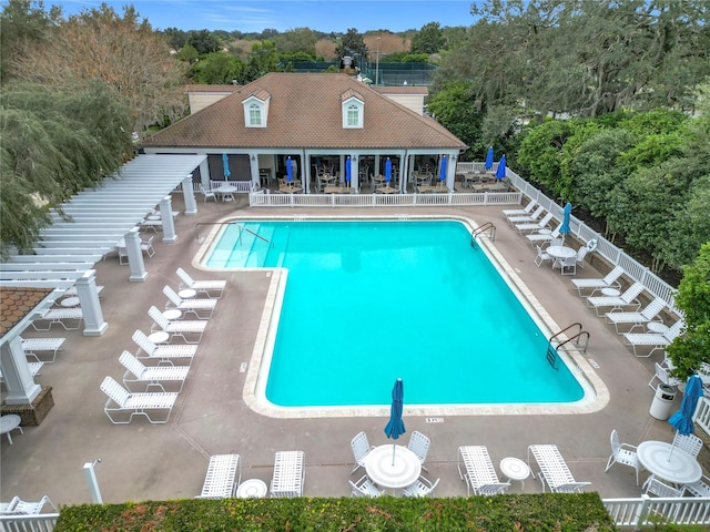 view of swimming pool featuring a patio area