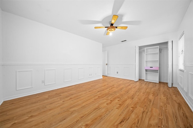 unfurnished bedroom featuring ceiling fan and light hardwood / wood-style floors