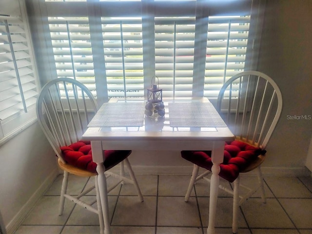 dining room with tile patterned floors