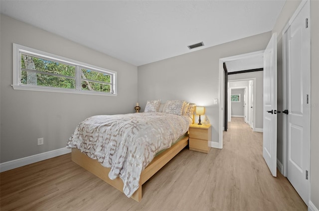 bedroom featuring light hardwood / wood-style floors