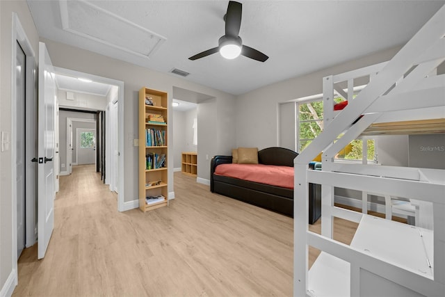 bedroom featuring ceiling fan and light hardwood / wood-style floors