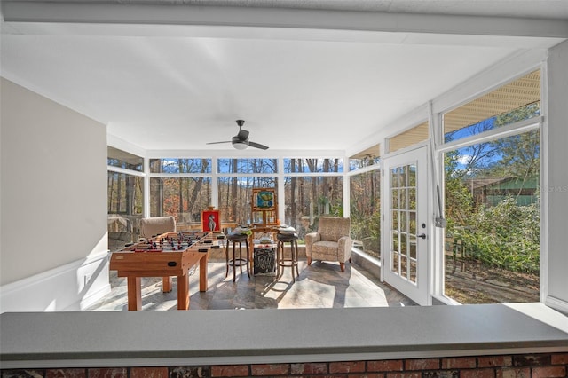 sunroom / solarium with ceiling fan