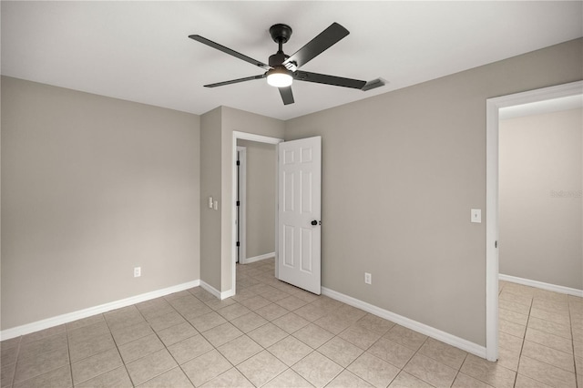 unfurnished bedroom featuring ceiling fan and light tile patterned floors