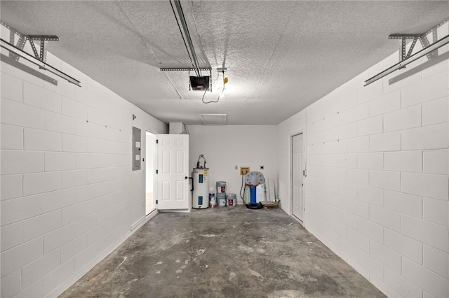 garage featuring electric panel, electric water heater, and a garage door opener