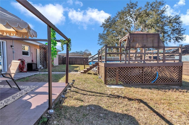 view of yard with a deck