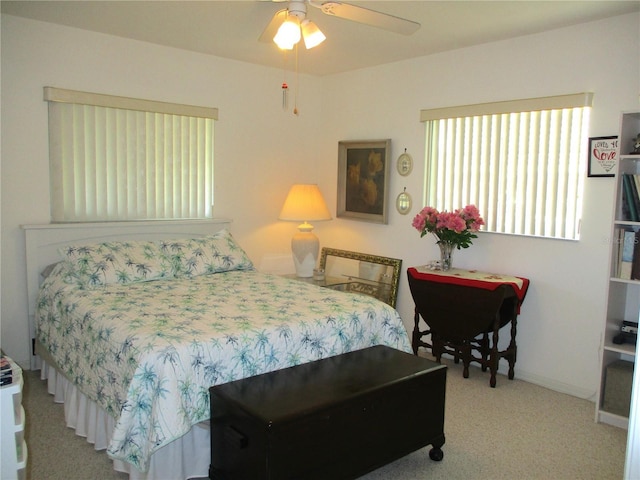 bedroom featuring ceiling fan and carpet floors