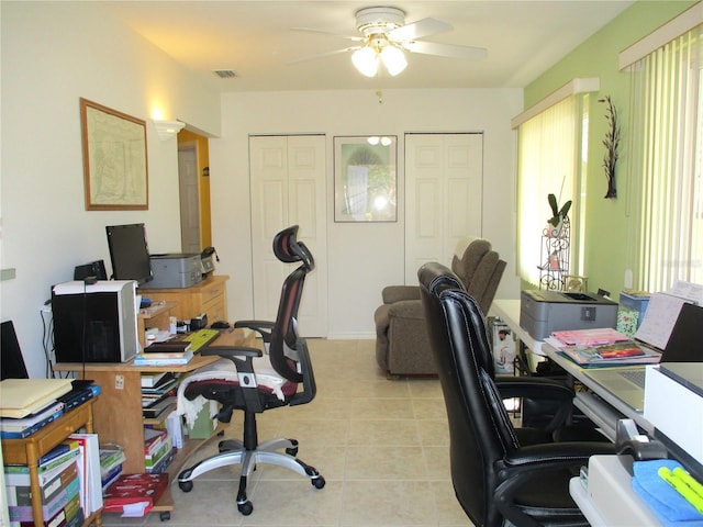 office space with ceiling fan