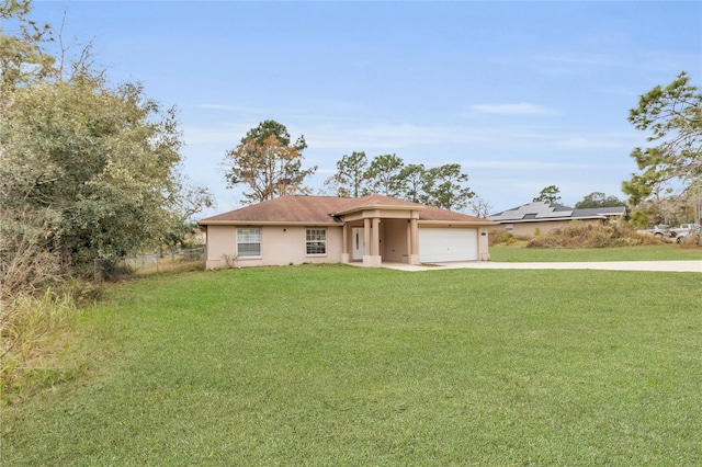 ranch-style home with a front yard and a garage