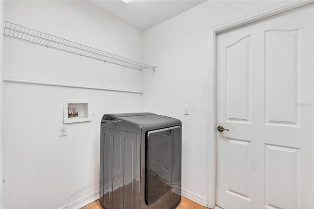 clothes washing area with washer / clothes dryer