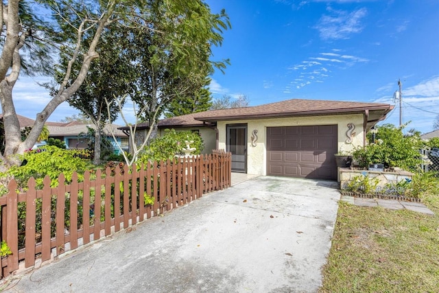 single story home with a garage