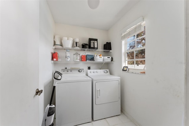 laundry room with washer and clothes dryer