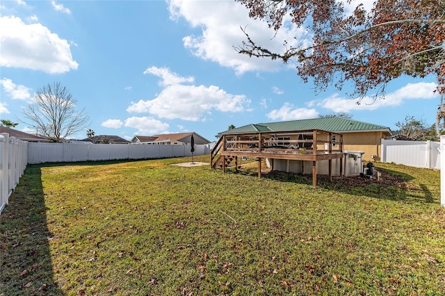 view of yard with a deck