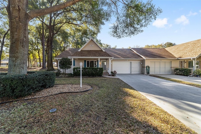 single story home featuring a garage