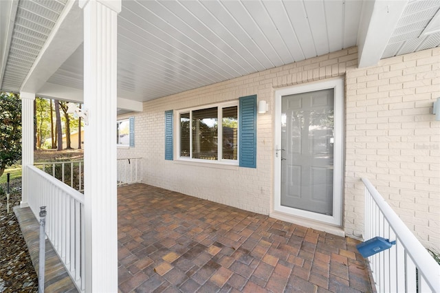 entrance to property with a porch