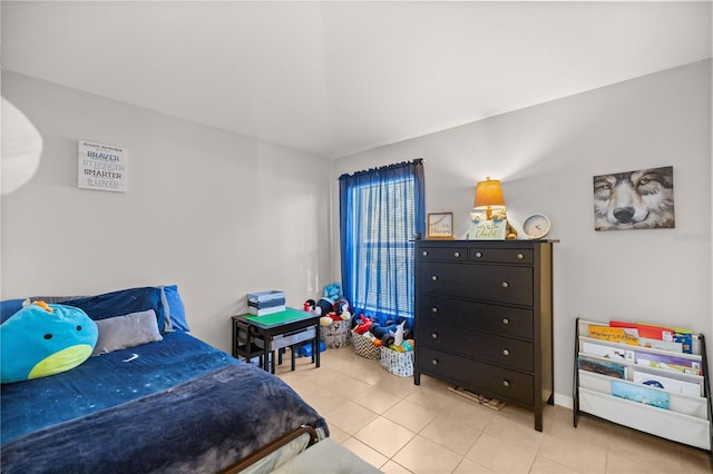 bedroom featuring tile patterned floors