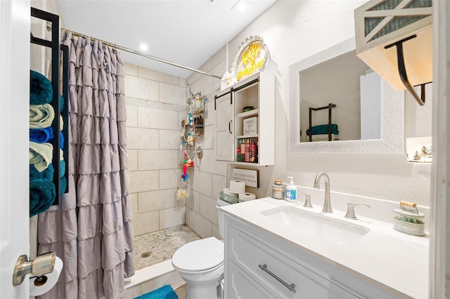 bathroom featuring vanity, curtained shower, and toilet