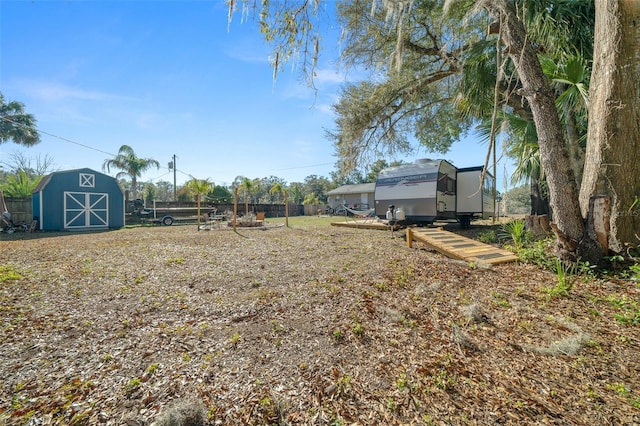 view of yard with a storage shed