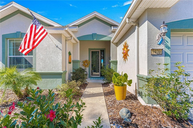 property entrance with a garage