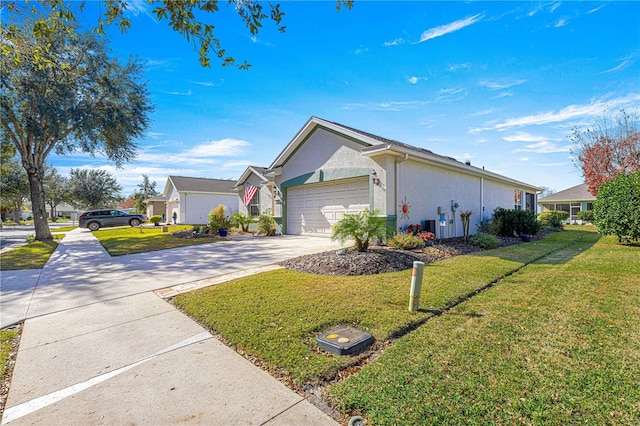 single story home featuring a garage and a front lawn