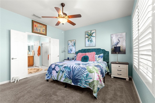 carpeted bedroom with ceiling fan and connected bathroom