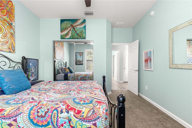 bedroom featuring carpet floors and ceiling fan