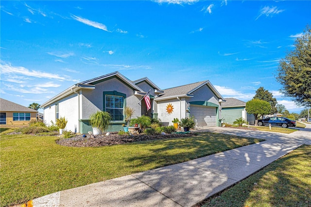 view of front of home featuring a front yard and a garage