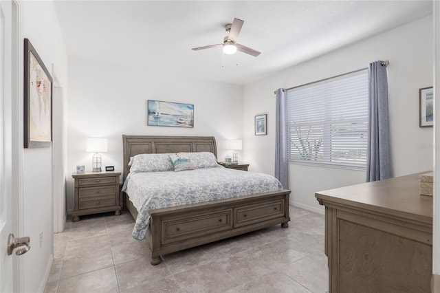 bedroom featuring light tile patterned floors and ceiling fan