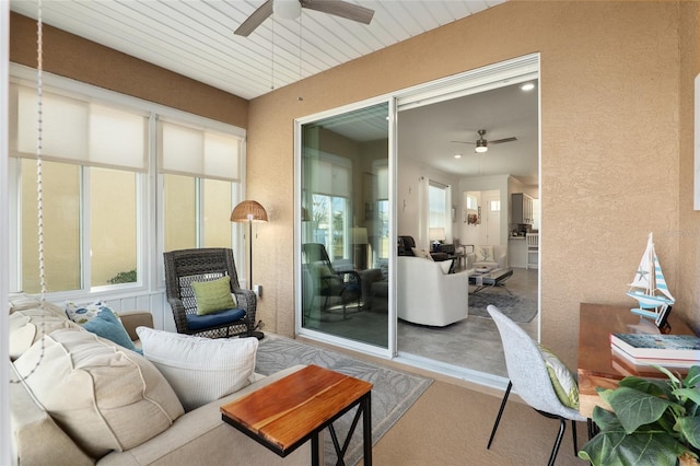 interior space featuring ceiling fan