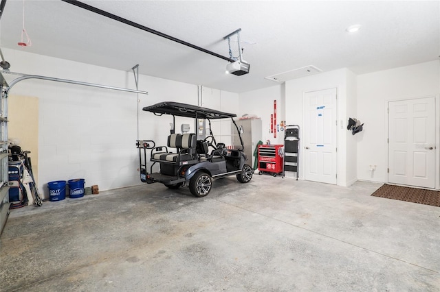 garage featuring a garage door opener