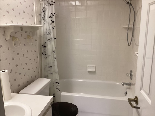 full bathroom featuring toilet, vanity, and shower / bath combo with shower curtain