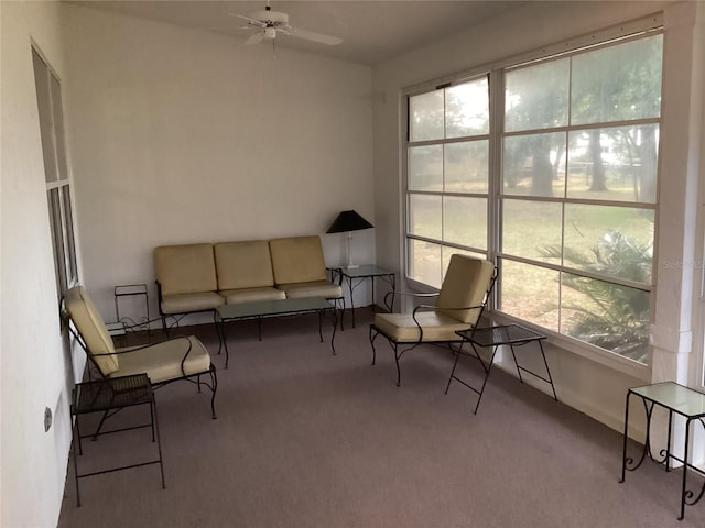 sunroom with ceiling fan