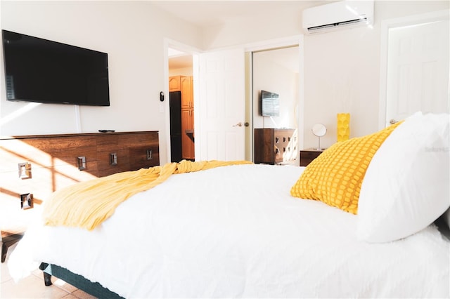 tiled bedroom with a wall mounted AC