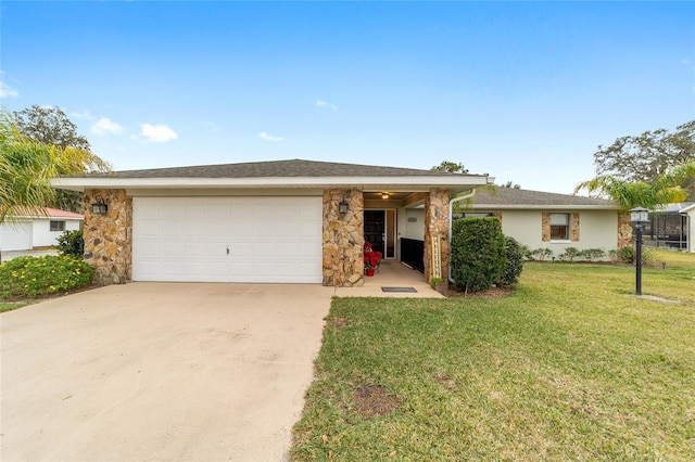 single story home featuring a front lawn and a garage