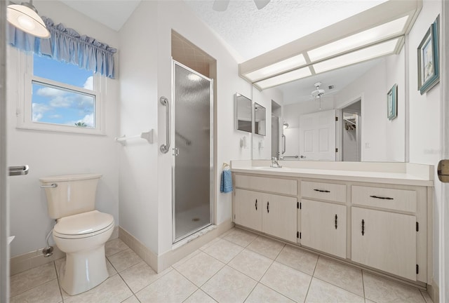 bathroom with a textured ceiling, walk in shower, vanity, and ceiling fan