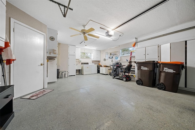 garage featuring a garage door opener and ceiling fan