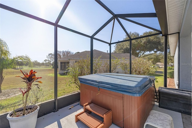 sunroom / solarium with a hot tub