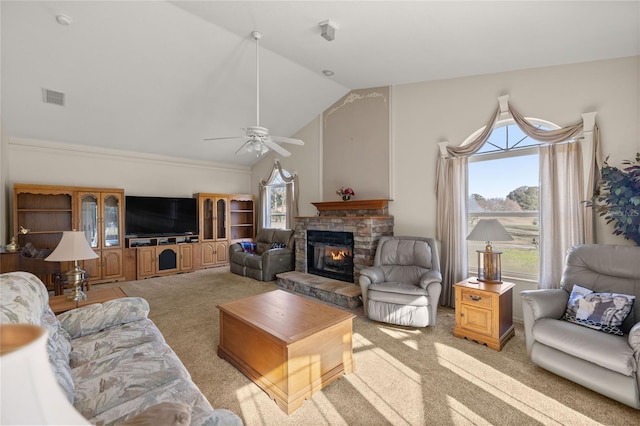 carpeted living room with ceiling fan, lofted ceiling, and a fireplace