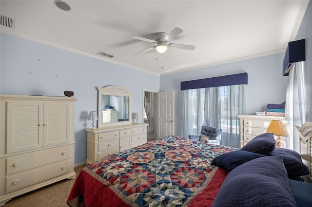 bedroom featuring carpet flooring, ceiling fan, and crown molding