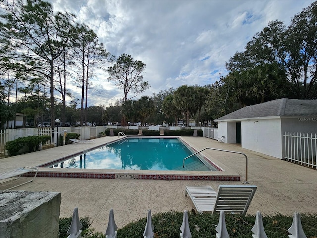 view of pool featuring a patio area